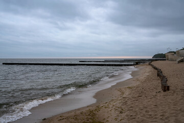 View of the Baltic Sea and wooden breakwaters of the city beach on a summer day, Svetlogorsk, Kaliningrad region, Russia