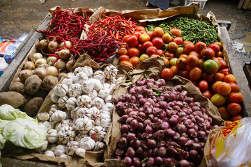 vegetables, tomatoes, garlic, shallots, chilies and potatoes which are sold in Indonesian traditional markets.