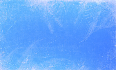 Abstract ice background. Blue background with cracks on the ice surface.