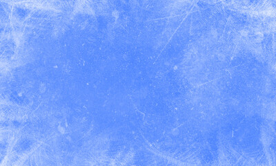 Abstract ice background. Blue background with cracks on the ice surface.