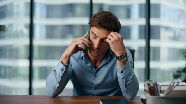 Worried business man talking phone closeup. Sad entrepreneur discussing problems