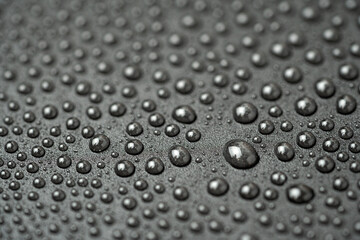 Water drops on a black background close-up