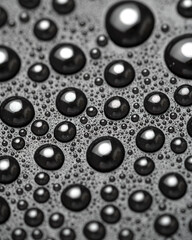 Water drops on a black background close-up