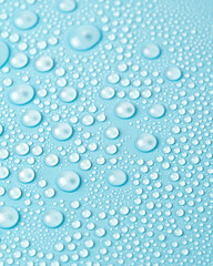 Water drops on a blue background close-up