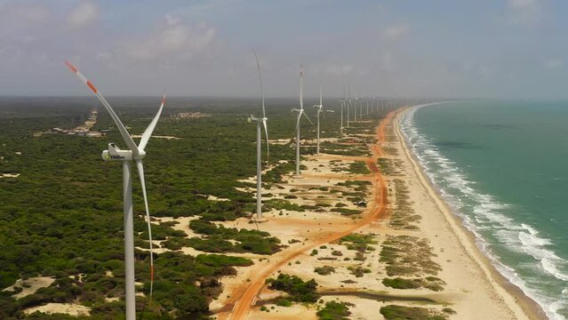 Aerial view of Wind turbines producing clean sustainable energy, clean energy future. Wind power plant. Mannar, Sri Lanka.