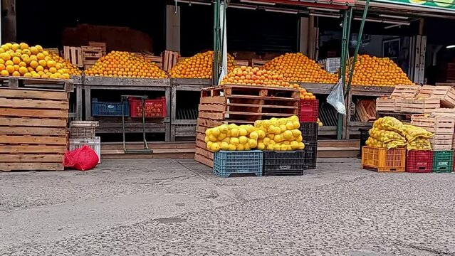 Slider Shot Of Local Fruits Market, Citrus (Orange) Displayed In Pyramids, Paraguay