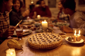 Close up of Thanksgiving pie on dining table during family dinner.