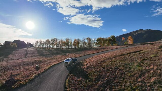 An Adventure Drone Video Of An Airstream And Jeep Gladiator Driving On Last Dollar Road In Colorado During The Peak Fall Foliage. Windy Dirt Roads Are The Best!