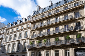 Paris, beautiful building in a luxury neighborhood, typical Haussmann facades
