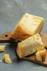 Gruyere Cheese hard yellow cheese. good melting cheese, particularly suited for fondues. Food recipe background. Close up
