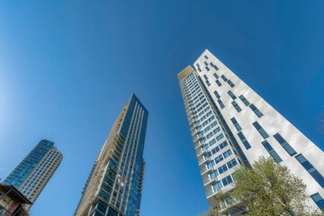 Residential buildings exterior in Austin Texas towering against vibrant blue sky