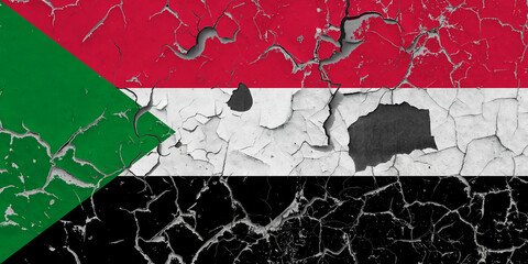 3D Flag of Sudan on an old stone wall background.