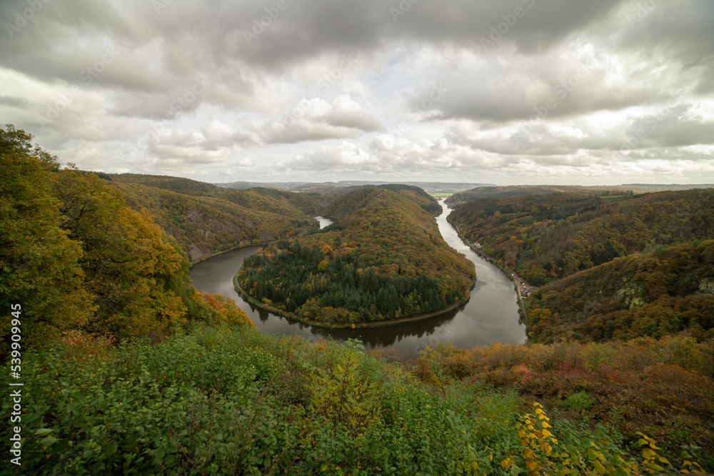 Wall mural aerial view of the saarschleife water gap carved by the saar river, germany