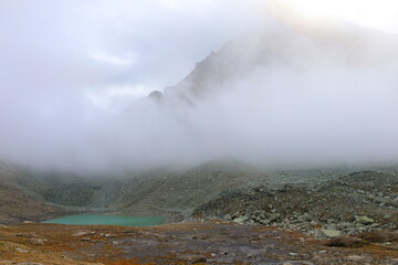 Mountain landscape of long distance hiking trail Tour Des Combins which crosses Switzerland to Italy via Bourg Saint Pierre, Fenetre Durand and Aosta Valley, TDC
