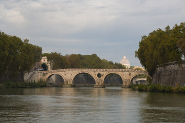 Panoramic view of bridge in the Tiber river in Rome during autumn season Lazio