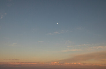 sunset on the beach with moon