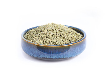 Fennel or Lukhnovi Seeds in Round Blue Pottery Bowl in Three Quarter or Side View Shot Isolated on White
