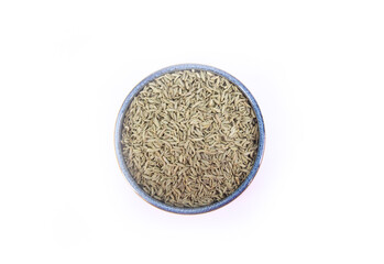 Fennel or Lukhnovi Seeds in Round Blue Pottery Bowl in Top Down or Flat Lay Shot Isolated on White
