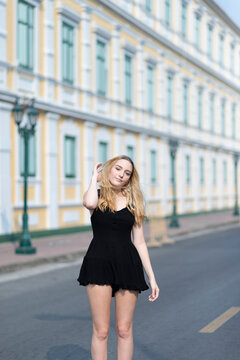 Beautiful model young woman enjoyment street portrait.
