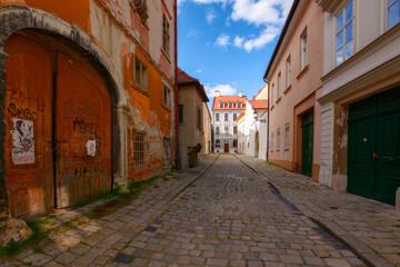 Obraz na płótnie Canvas bratislava, slovakia - oct 16, 2019: cobblestone streets of the slovakian capital. cozzy paces in the city center. beautiful architecture on a sunny day