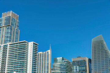 Obraz na płótnie Canvas Austin Texas skyline with luxury apartments facade against blue sky background
