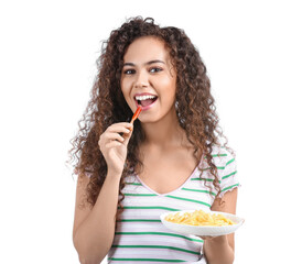 Young African-American woman with unhealthy food on white background