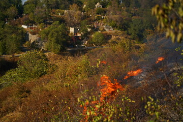 Fires in mountainous areas. Ignition of dry grass, shrubs and trees.