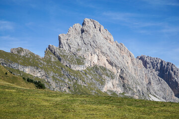 Beautiful and distinctive Fermeda mountain in the italian dolomites. Perfect day for hiking with a wonderful clear blue sky. Gardena Valley, South Tyrol, Alto Adige, Italia.