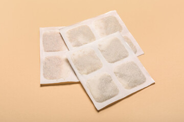 Mustard plasters on beige background