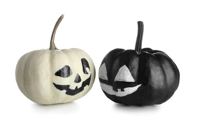 Halloween pumpkins with drawn face on white background