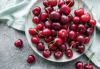 Fresh red cherries fruit in bowl