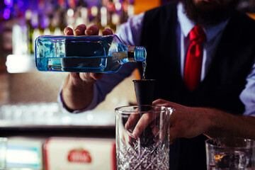 Bartender guy working prepare cocktail skills