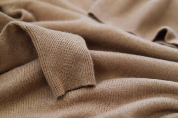 Knitted cashmere texture background. Warm sweater, pullover, jersey.