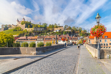 The hillside medieval Marienberg Fortress along the banks of the Main River in the historic Bavarian town of Wurzburg, Germany.	