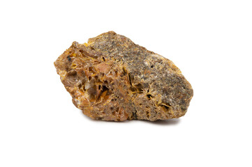 A raw shard of the mineral wulfenite. Brown stone with a porous structure