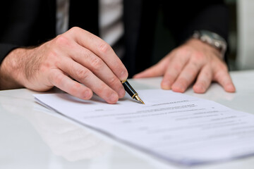 Business Man approve sign on business document. Business approve sign and certificate concept. Businessman Hands Signing a document	