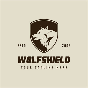 wolf head of shield vector logo vintage illustration template icon graphic design. wildlife sign or symbol for nature conservation with emblem and badge
