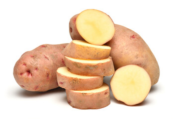 potatoes close up, whole and sliced, objects are isolated on a white background