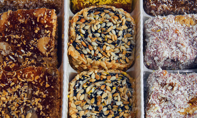 Oriental sweets, assorted in one package close-up. A variety of oriental sweets with different ingredients