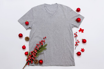 Close up grey blank template t shirt with copy space and Christmas Holiday concept. Top view mockup...