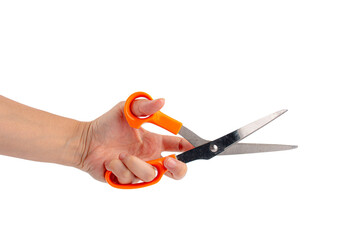 Hand holding office stationery scissors cutting on transparent background  - obrazy, fototapety, plakaty