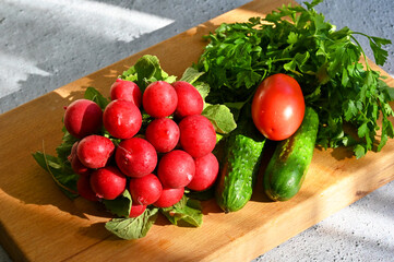 The sun's rays illuminate the vegetables that lie on the table 