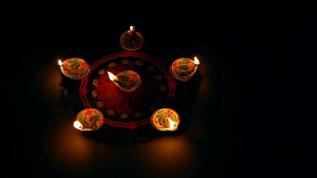 Colorful diya lamps lit during diwali celebration. Indian festival Happy Diwali, Holiday Background, Diwali celebration greeting card