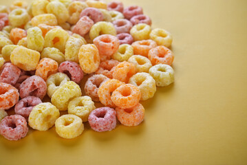 Fruit Cornflakes on a yellow background