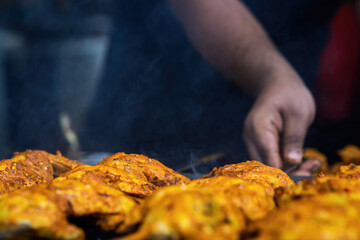 Cooking chicken skew Kebab barbeque. Traditional Indian and Paksitan dish cooked on charcoal and flame.