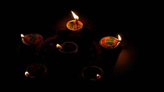 Colorful diya lamps lit during diwali celebration. Indian festival Happy Diwali, Holiday Background, Diwali celebration greeting card