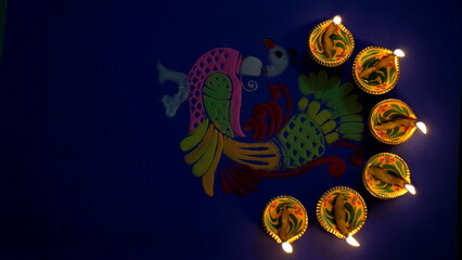 Colorful diya lamps lit during diwali celebration. Indian festival Happy Diwali, Holiday...