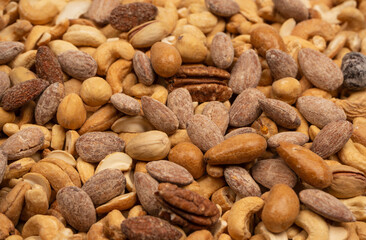 A group of almonds, pistachios, walnuts, macadamia, cashews.