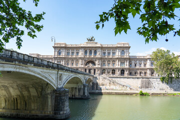 Naklejka premium View over the river Tiber with the bridge Ponte Umberto I and in the background the city courthouse (Corte di cassazione) in Rome, Italy