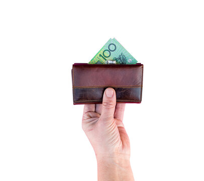 woman hand holds wallet with Australian dollar paper money on transparent isolated background
